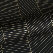 Papier peint à chevrons noir et doré