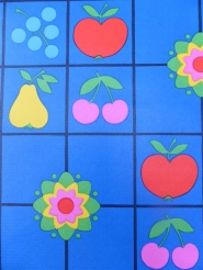 fruit and flowers on a blue background