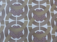 papier peint geometrique cercles brun avec fleur purpre